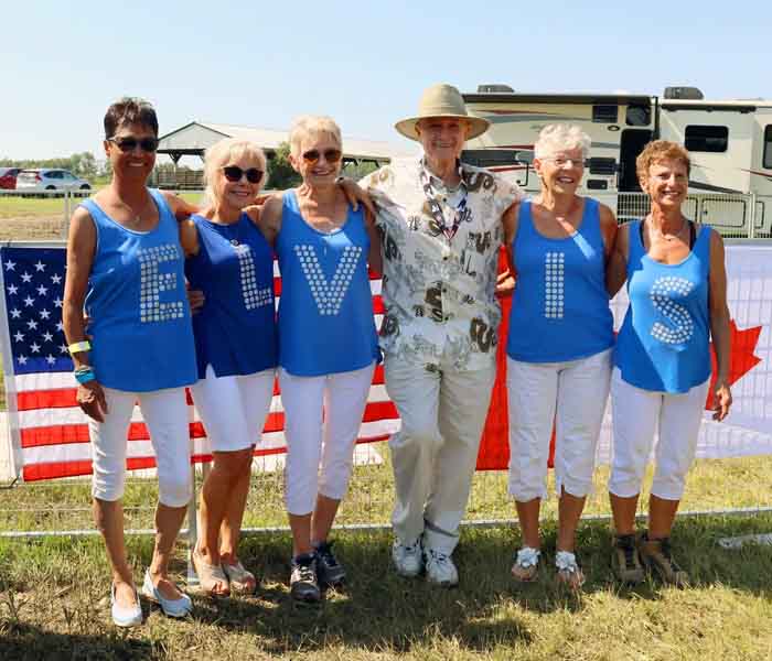 CHRISTOPHER with the E-L-V-I-S ladies