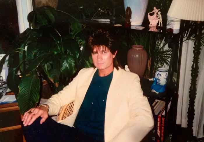 Christopher Riordan sporting the 1980s look