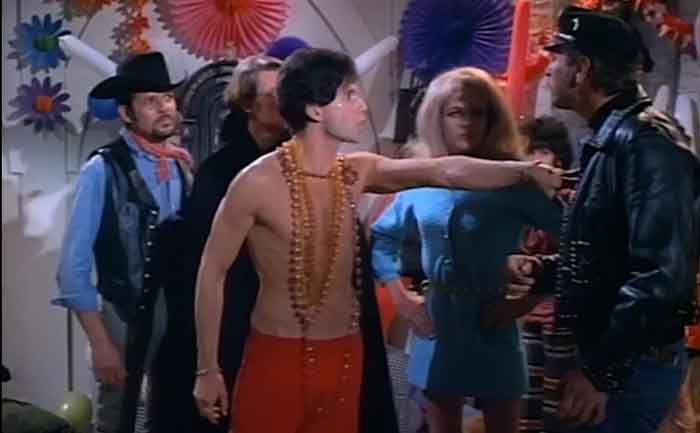 Christopher with Ron Gans in a scene from the movie